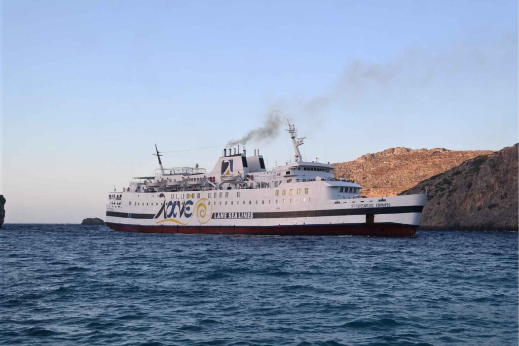 Large passenger ferry arriving at the rugged island harbor of Kythera - Hike Greece