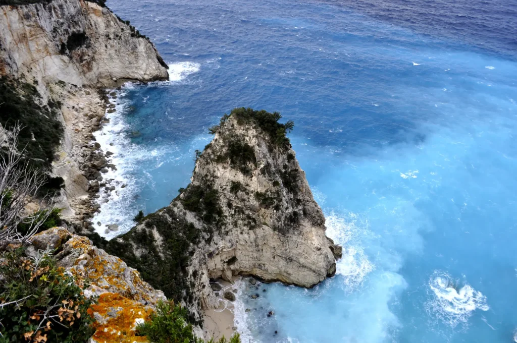 Limestone cliffs and a turquoise cove on the north coast of Kefalonia